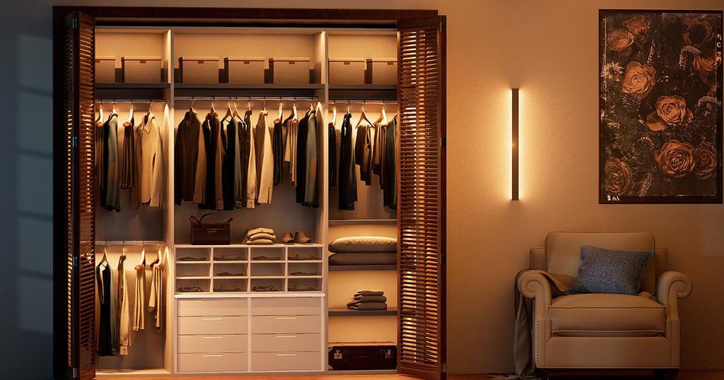 A modern open wardrobe with warm LED lighting illuminating hanging clothes, shelves, and drawers, creating a cozy and organized closet space.